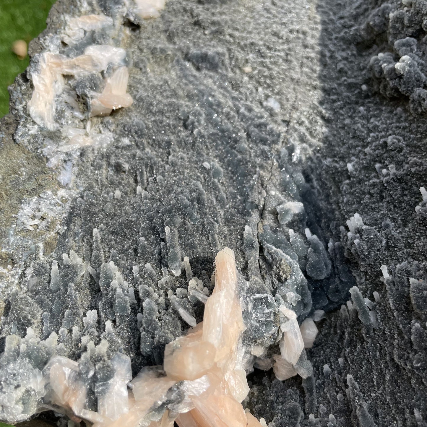 Peach Stilbite on Black Chalcedony