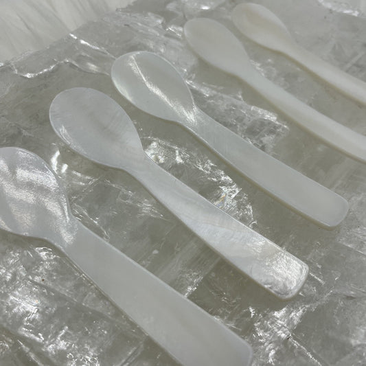 Mother of pearl caviar spoons showing natural nacre iridescence