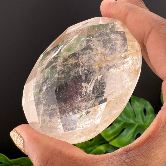 Hematite in Clear Quartz Faceted Palm Stone