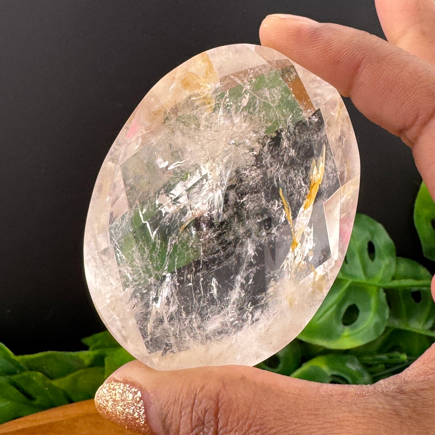 Hematite in Clear Quartz Faceted Palm Stone