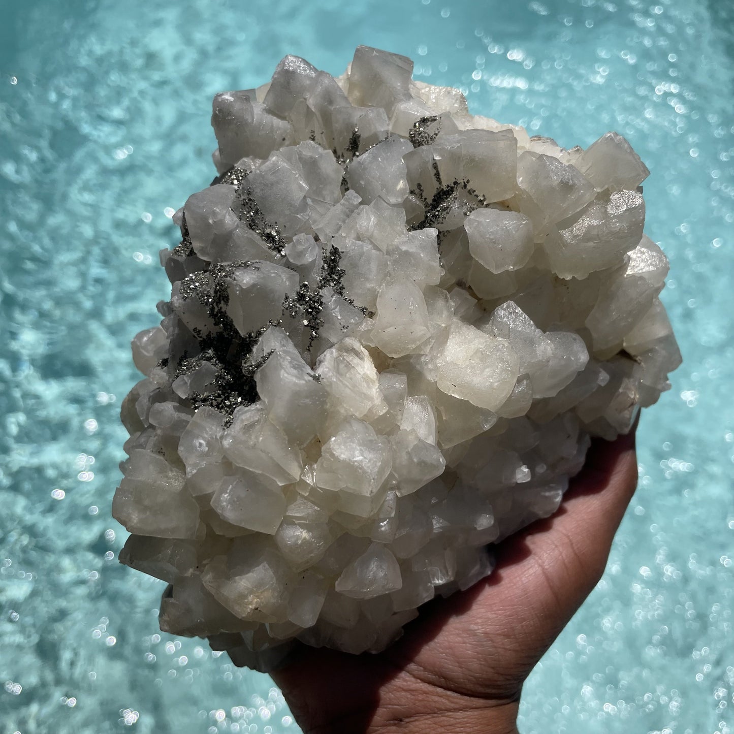 Pyrite on Large Calcite Cluster