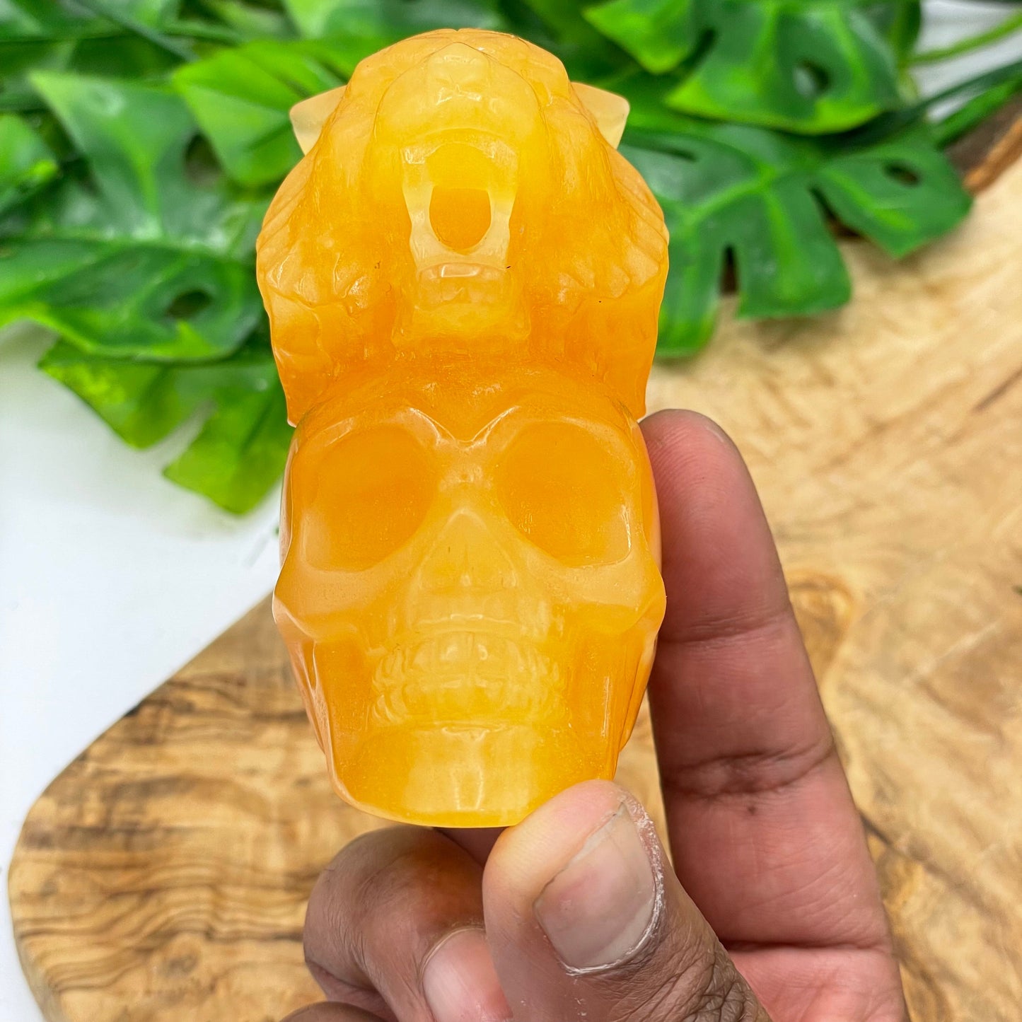Orange Calcite Wolf on Skull
